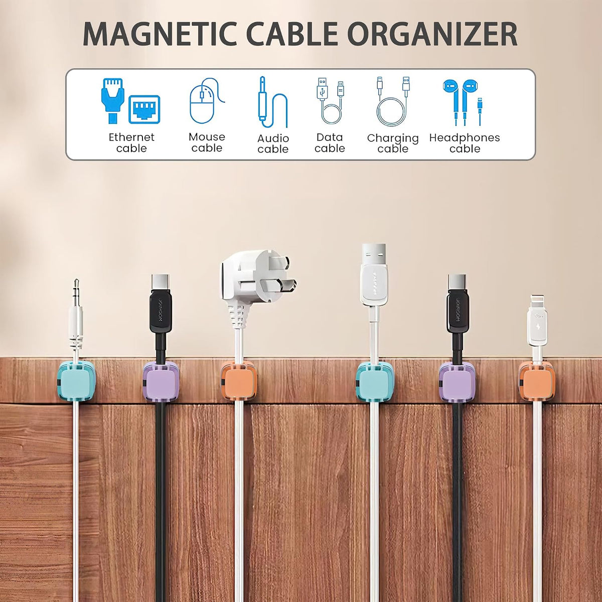 Magnetic cable clips organizing multiple cords along a wooden desk